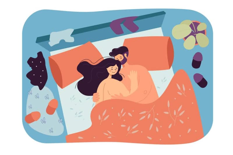 Couple dans un lit illustrant l’insémination naturelle