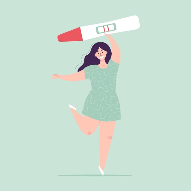 Femme enceinte avec test de grossesse positif