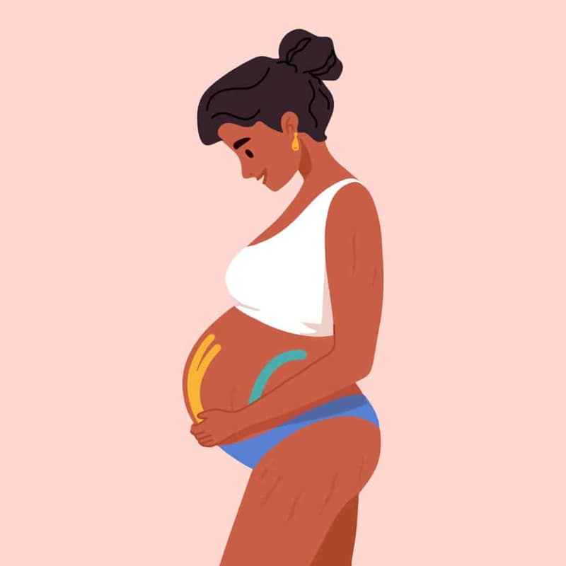 Femme enceinte illustrant la question tomber enceinte pendant les règles
